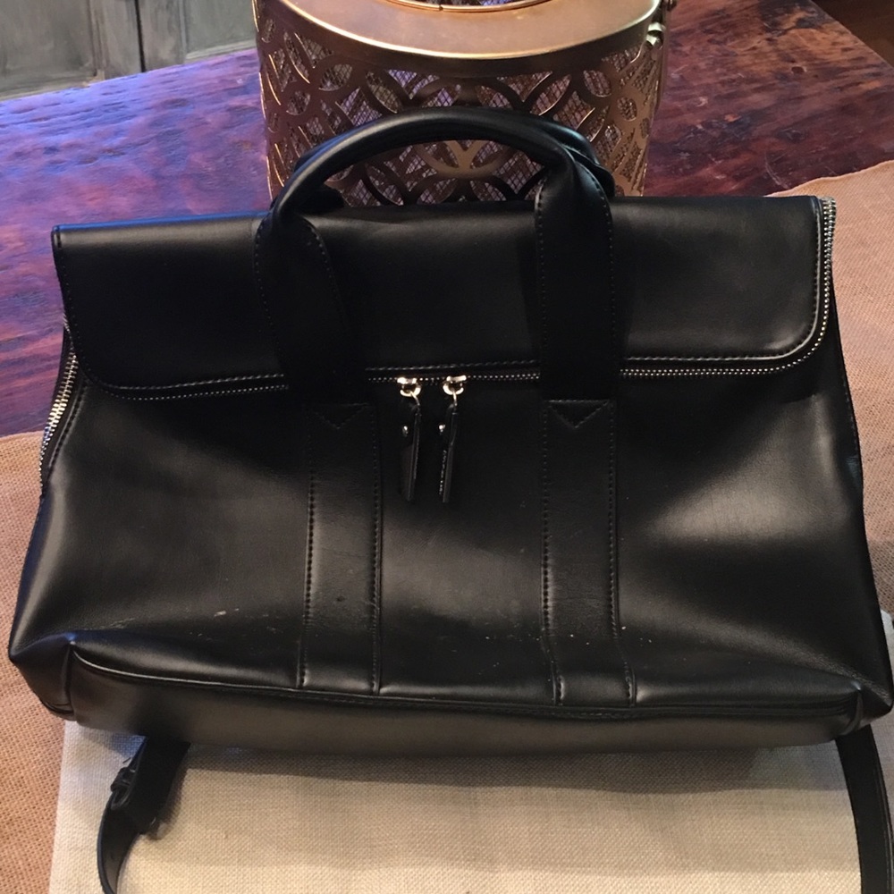 Gently used black flap purse